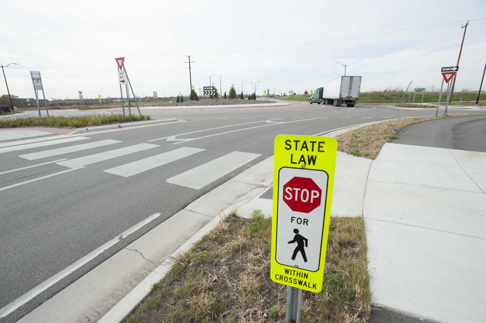 Stop for pedestrians sign at a crosswalk